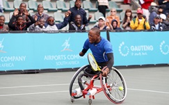 2013 Airports Company South Africa SA Wheelchair Tennis Open: Day 4 Supporters cheer on South African wheelchair tennis quad star Lucas Sithole at the 2013 Acsa SA Open (Photo: Reg Caldecott)