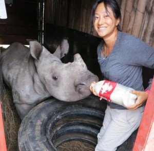 Kim Putman with baby rhino in South Africa Kim Putman with baby rhino in South Africa