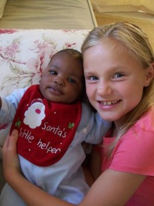Noah as a baby, with his new sister