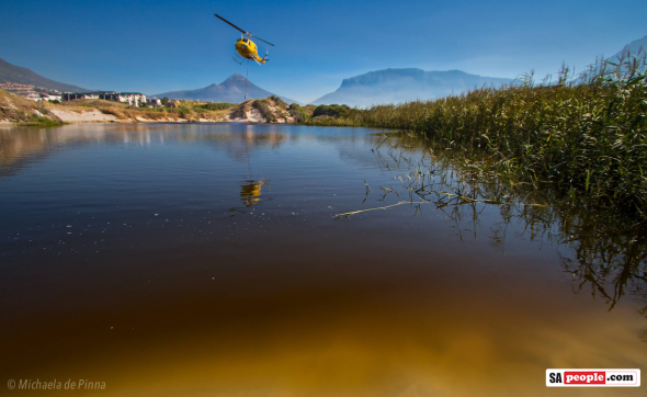 Helicopter Dipping into the Disa River, Hout Bay, this morning Helicopter Dipping into the Disa River, Hout Bay, this morning