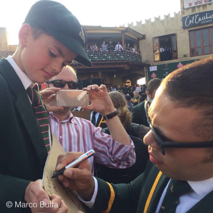 Bryan Habana signs an autograph in South Africa