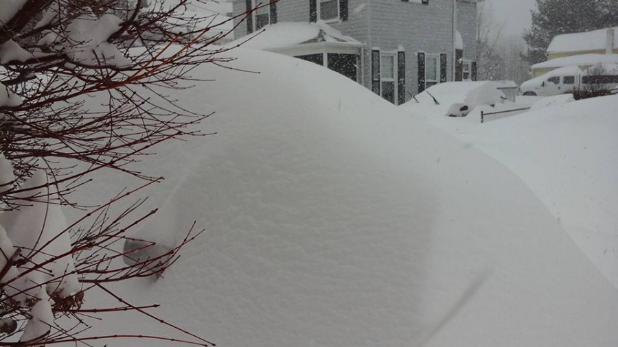 Car in snow storm Car in storm, USA