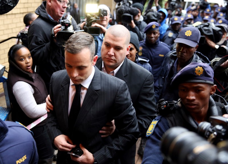 Former Paralympian Oscar Pistorius arrives to be sentenced for murder of his girlfriend Reeva Steenkamp at the Pretoria High Court, South Africa June 13,2016. REUTERS/Siphiwe Sibeko