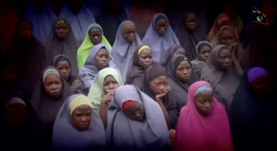 A still image from a video posted by Nigerian Islamist militant group Boko Haram on social media, seen by Reuters on August 14, 2016, shows dozens of girls the group said are school girls kidnapped in the town of Chibok in 2014. Social Media