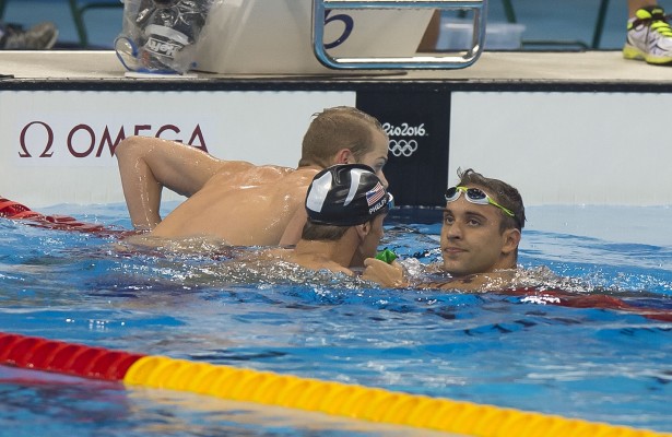 Michael Phelps celebrates is congratulated by South Africa's Chad le Clos after his victory and reclaims the Gold medal at the Rio Olympic games. RIO DE JANEIRO, BRAZIL - AUGUST 09: Day 4 on Day 4 of the Rio 2016 Olympic Games at the Olympic Aquatics Stadium on August 9, 2016 in Rio de Janeiro, Brazil. (Photo by ©Christiaan Kotze/SASPA