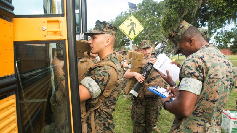 U.S. Marine Corps recruits load buses during an evacuation ahead of the arrival of Hurricane Matthew, from the training facility at Parris Island, South Carolina October 6, 2016. USMC/Lance Cpl. Carlin Warren/Handout via Reuters
