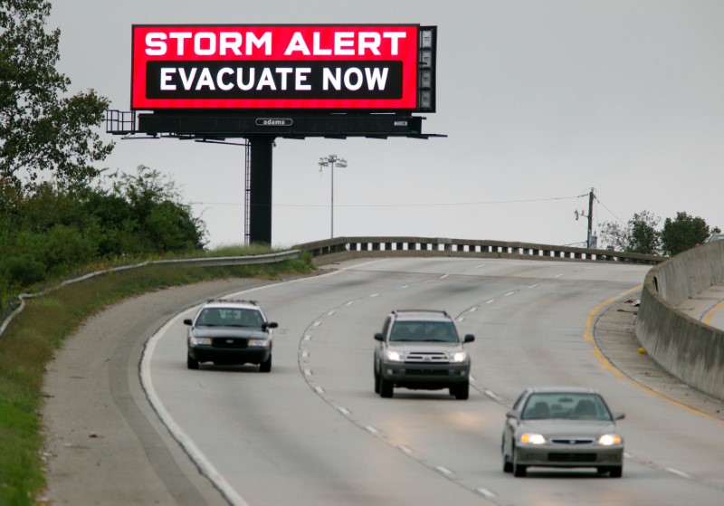 A large electronic billboard urges people to evacuate the Charleston and coastal areas before the arrival of Hurricane Matthew, in North Charleston, South Carolina, U.S., October 7, 2016. REUTERS/Jonathan Drake
