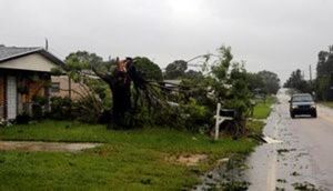 A fallen tree is seen outside a house after Hurricane Matthew hits in Melbourne, Florida, U.S., October 7, 2016. REUTERS/Henry Romero