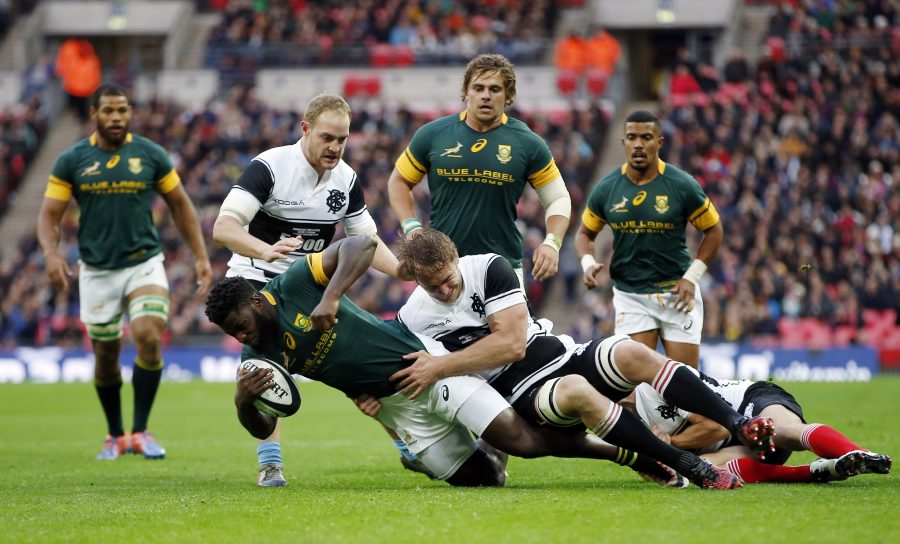 Britain Rugby Union - Barbarians v South Africa - The Killik Cup - Wembley Stadium - 5/11/16 South Africa's Jamba Ulengo is tackled by Barbarians' Martin Muller Action Images via Reuters / Paul Childs Livepic