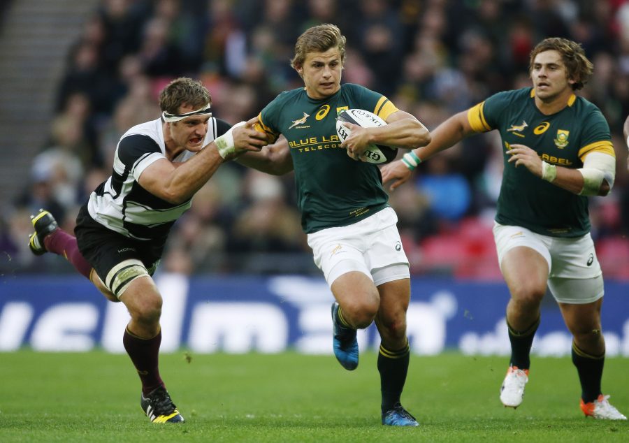 Britain Rugby Union - Barbarians v South Africa - The Killik Cup - Wembley Stadium - 5/11/16 South Africa's Pat Lambie is tackled by Barbarians' Luke Whitelock Action Images via Reuters / Paul Childs Livepic EDITORIAL USE ONLY.