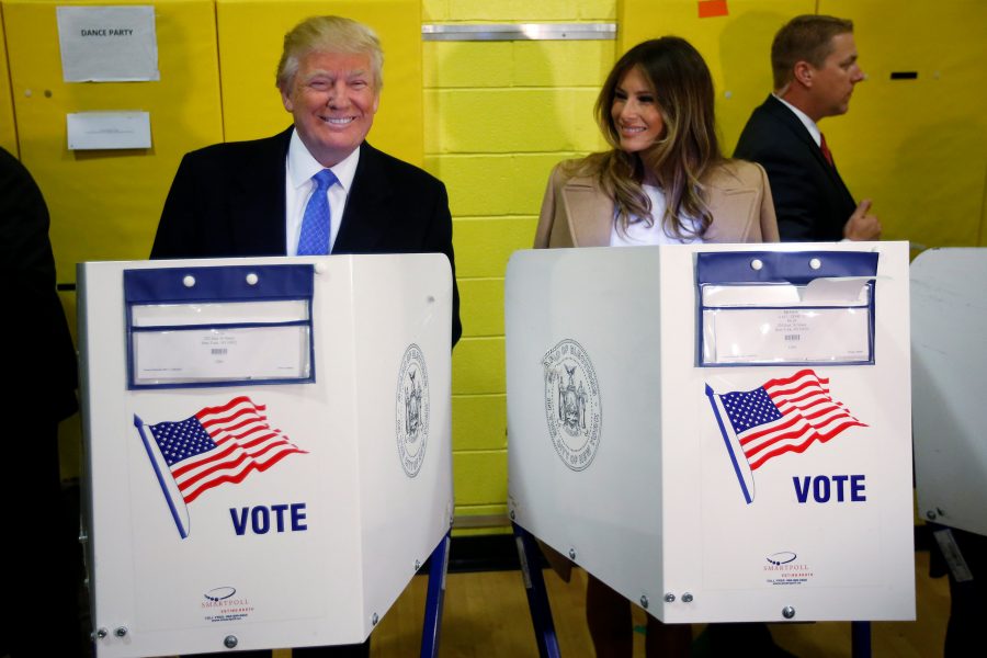 Republican presidential nominee Donald Trump and his wife Melania Trump vote at PS 59 in New York, New York, U.S. November 8, 2016. REUTERS/Carlo Allegri
