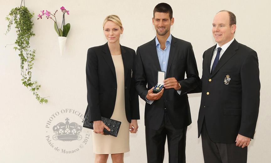 Princess Charlene, Novak Djokovic and Prince Albert II Princess Charlene, Novak Djokovic and Prince Albert II