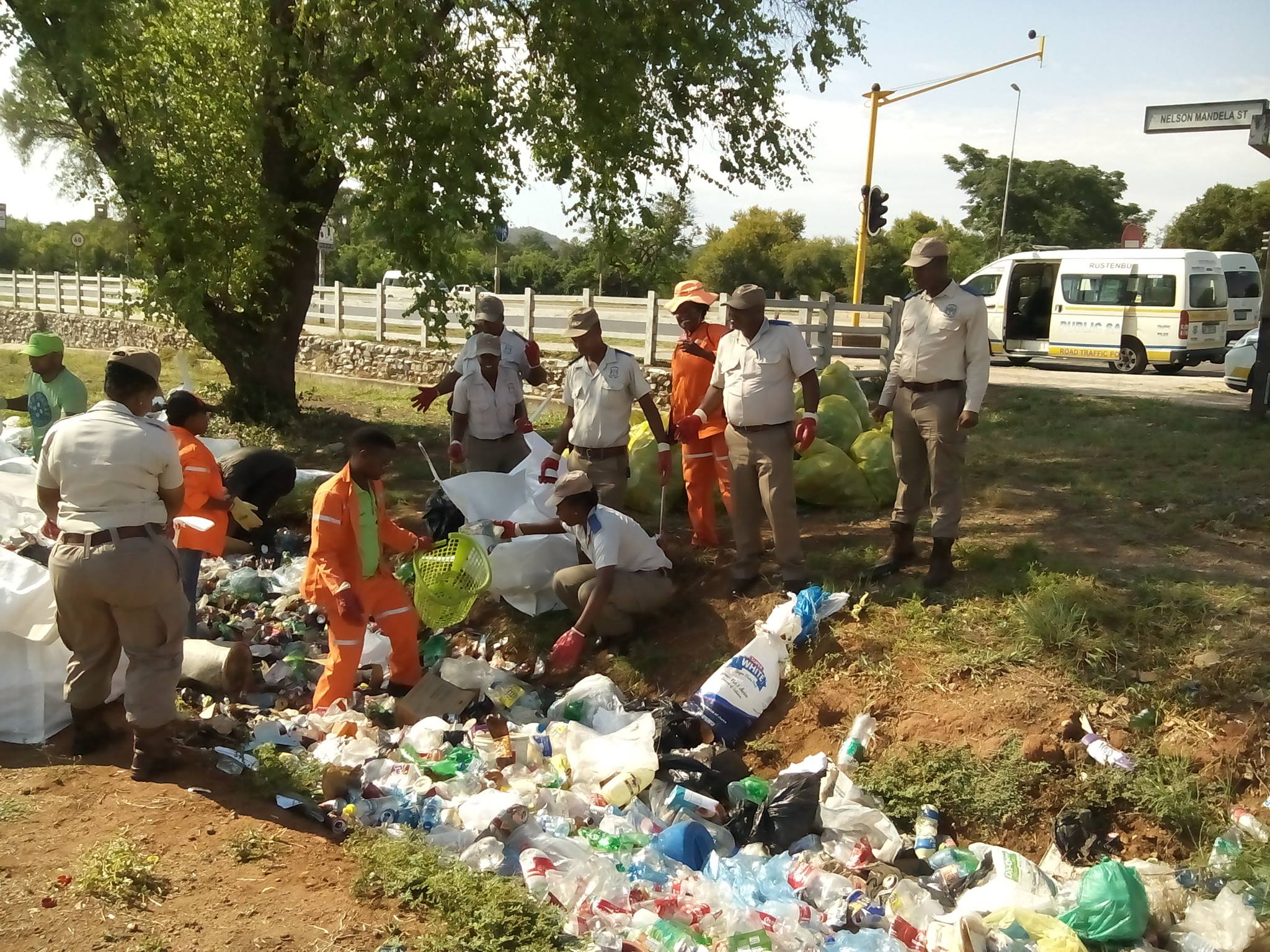 Officer 'Heroes' Inspire Others to RollUpSleeves and Clean Up South