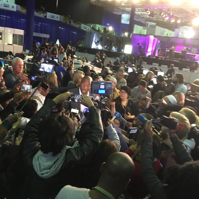 Mmusi-mobbed by journalists