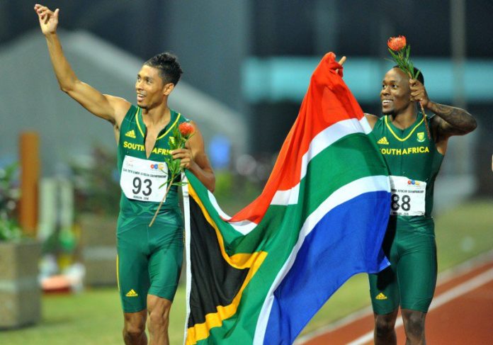 Wayde van Niekerk and SA flag