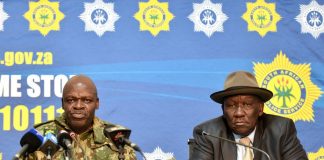 South Africa’s police commissioner, Khehla Sitole, and police minister, Bheki Cele