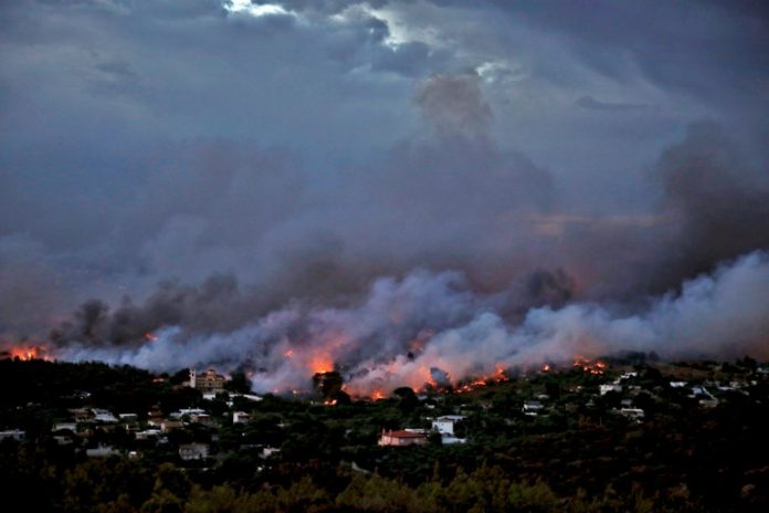 2018-07-24T090011Z_2_LYNXMPEE6N08P_RTROPTP_4_GREECE-WILDFIRE