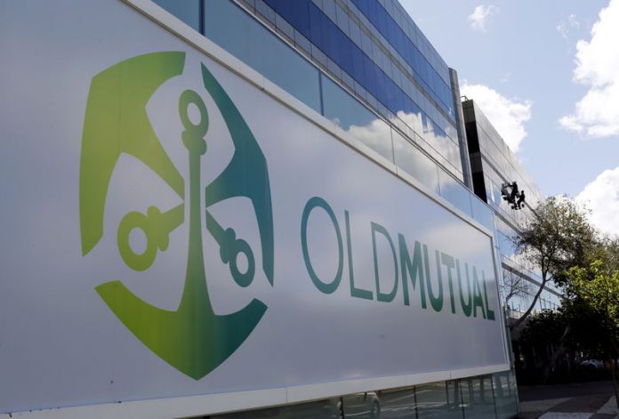 Workers clean windows outside the Cape Town headquarters of Anglo-South African financial services company Old Mutual
