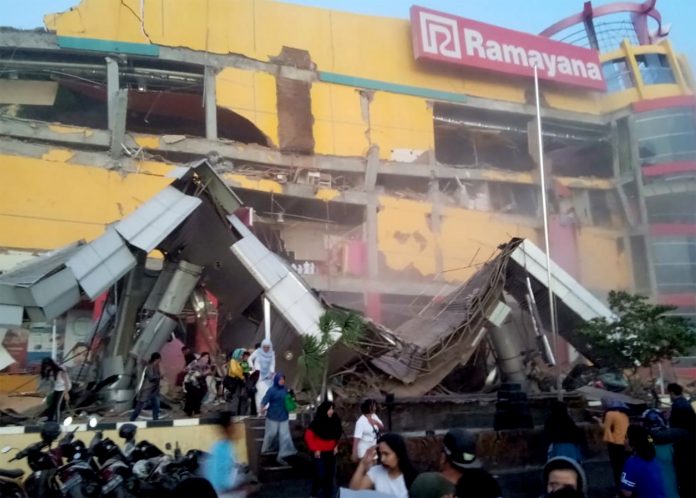 A shopping center heavily damaged following an earthquake in Palu, Central Sulawesi