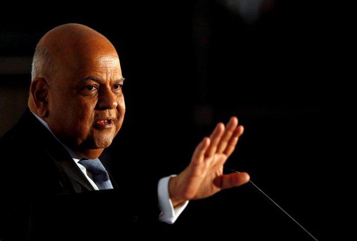 FILE PHOTO: Finance Minister Pravin Gordhan gestures during a business summit in Sandton