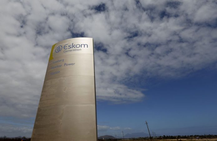 The logo of state power utility Eskom is seen outside Cape Town's Koeberg nuclear power plant