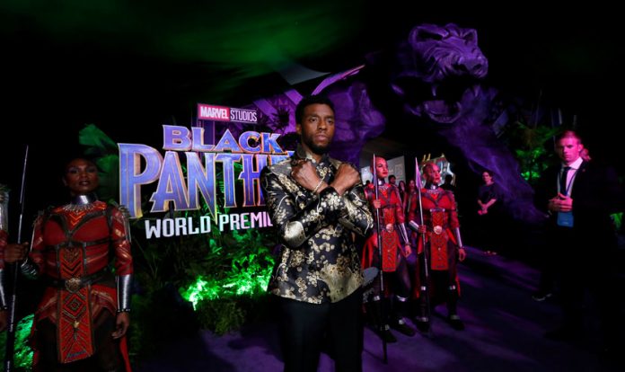 Cast member Boseman poses at the premiere of