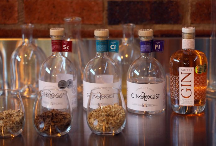 Bottles of gin and ingredients are seen at a distillery in Johannesburg