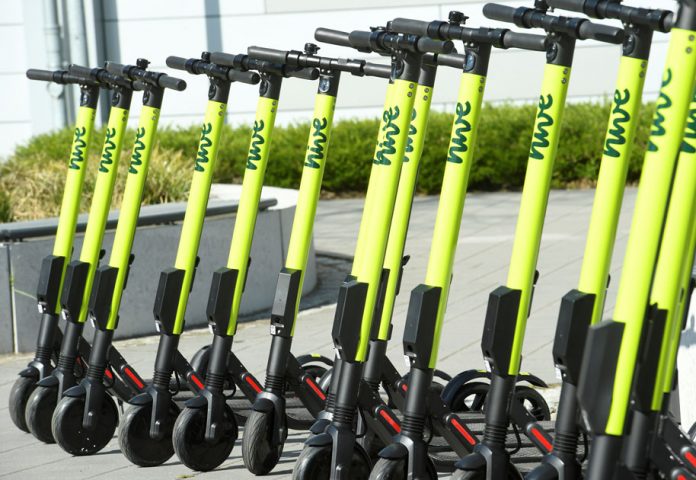 FILE PHOTO: E-scooters are lined up during a presentation at the DESY campus in Hamburg