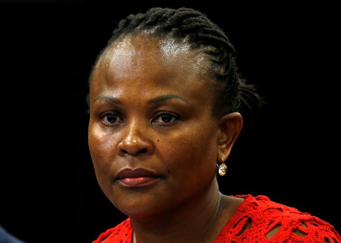 FILE PHOTO: Public Protector Busisiwe Mkhwebane listens during a briefing at Parliament in Cape Town Public Protector Busisiwe Mkhwebane listens during a briefing at Parliament in Cape Town, South Africa October 19, 2016. REUTERS/Mike Hutchings/File Photo