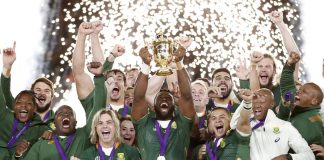 South Africa's Siya Kolisi celebrates with the Webb Ellis trophy after winning the World Cup Final.