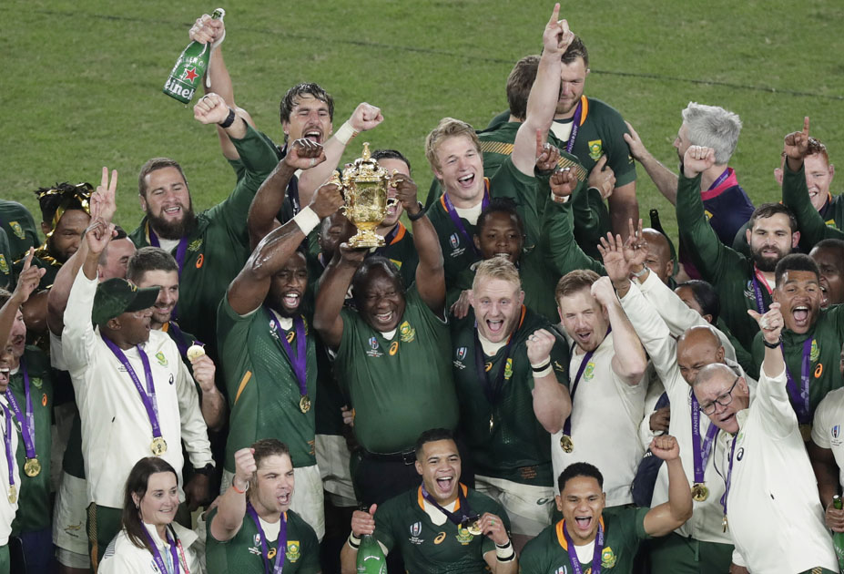 South Africa's Siya Kolisi celebrates with the Webb Ellis trophy after winning the World Cup Final.