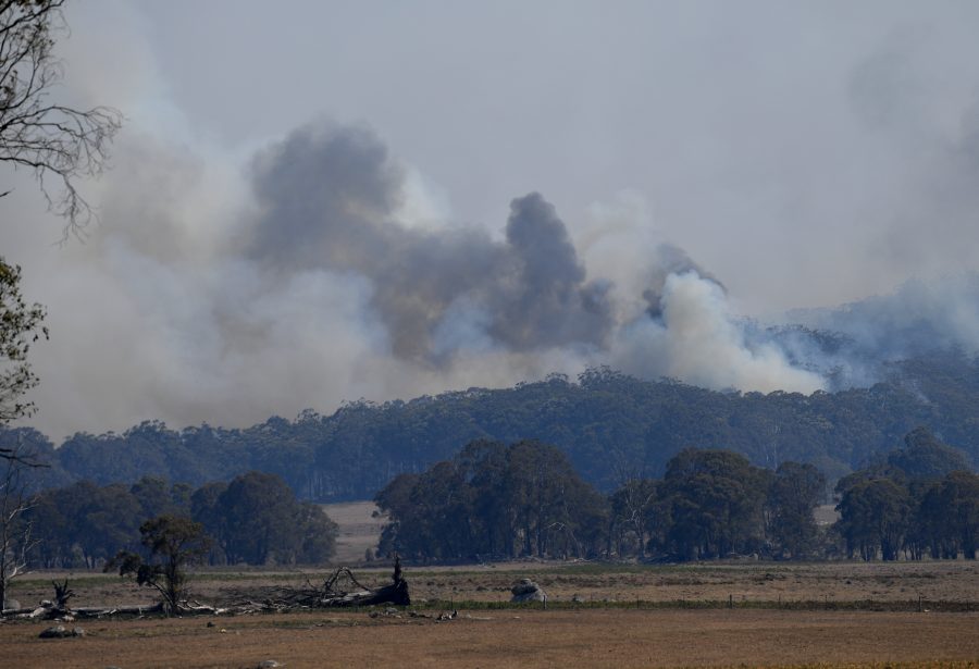 Smoke from a large bushfire is seen outside Wytaliba, near Glen Innes