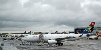 SAA aircraft stand on the runway at O.R. Tambo International Airport in Johannesburg