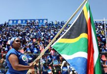 Supporters of South African opposition party, the Democratic Alliance attend the party's election manifesto launch in Johannesburg
