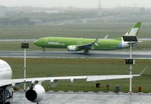 An aircraft from South African low cost airline Kulula takes off from Cape Town International airport