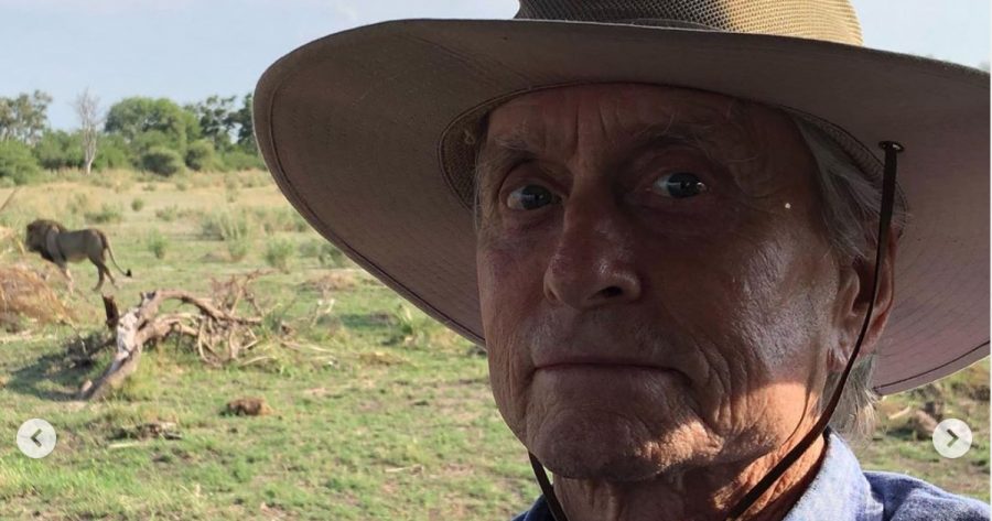 michael douglas spots lion in africa holiday
