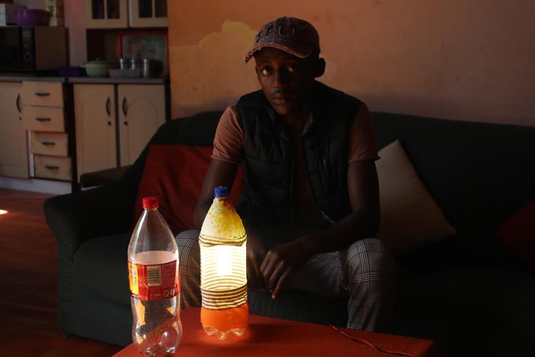 creates lamps from plastic bottles