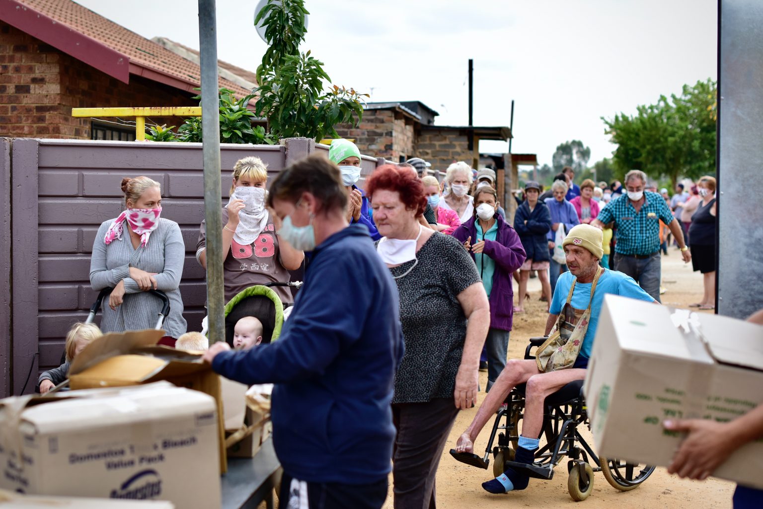 PHOTOS Poverty Knows No Race as Lockdown Feeding Scheme Delivers