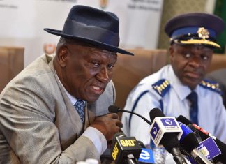 south african police minister bheki cele looting liquor stores
