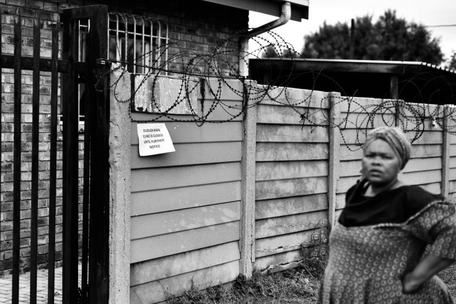Local resident stands confused outside the now shut Duduza Clinic, Nigel. Local resident stands confused outside the now shut Duduza Clinic, Nigel.