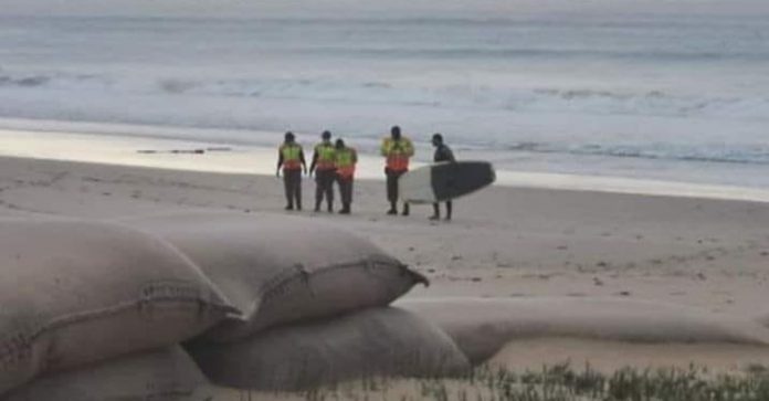 cops-arrest-surfer-south-africa-th