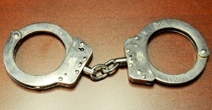 handcuffs-anc-councillor migrant trafficker