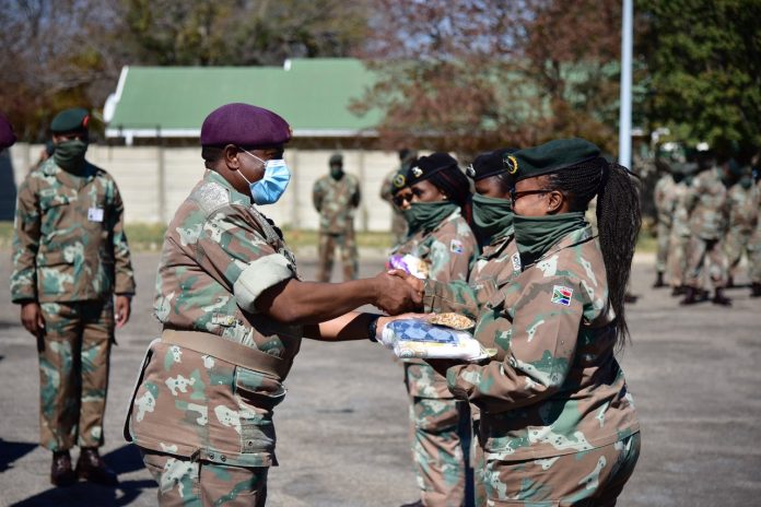 sandf soldiers mothers hygiene packs sa 2 Lieutenant General R. Maphwanya handing over hygiene parcels to female officers, after which a near 324 female enlistees line up – Doornkop, Johannesburg.