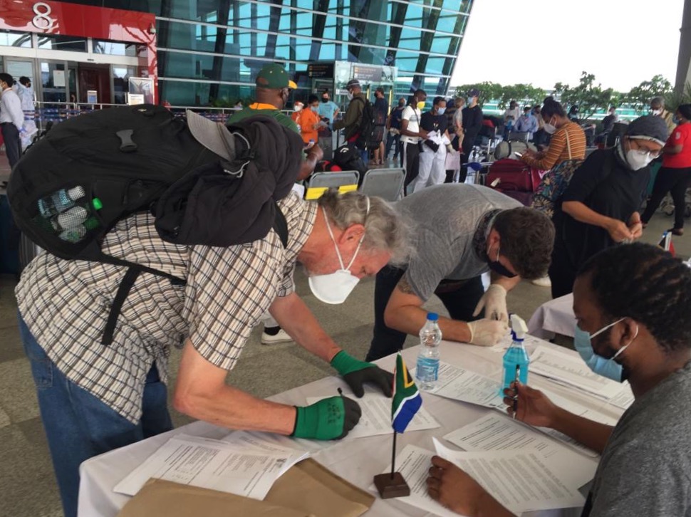 South African Citizens fill out mandatory paperwork before their departure – Delhi, India