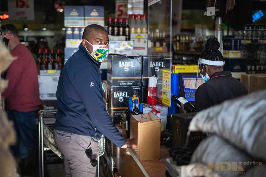 south africans queue alcohol bottle stores