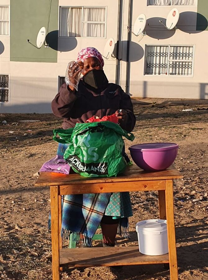 lady selling vetkoek curro school