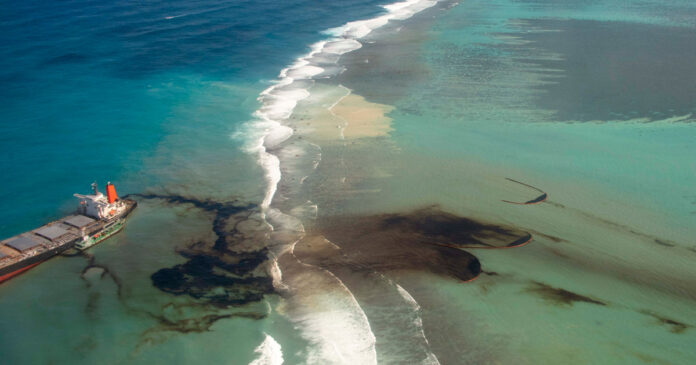 mauritius-oil-spill-thecon MV Wakashio, a Japanese owned Panama-flagged bulk carrier ship leaks oil after drifting ashore over coral reefs. Etat-major des Armees/EPAhandout