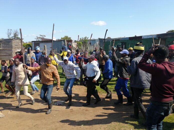 fairview_racecourse_protest__2020_extra_large Some of the former employees of Dippin Blu Racing in Fairview, Port Elizabeth who stormed the stables in protest on Thursday, killing one horse and injuring over 20 others. Photo: Mkhuseli Sizani