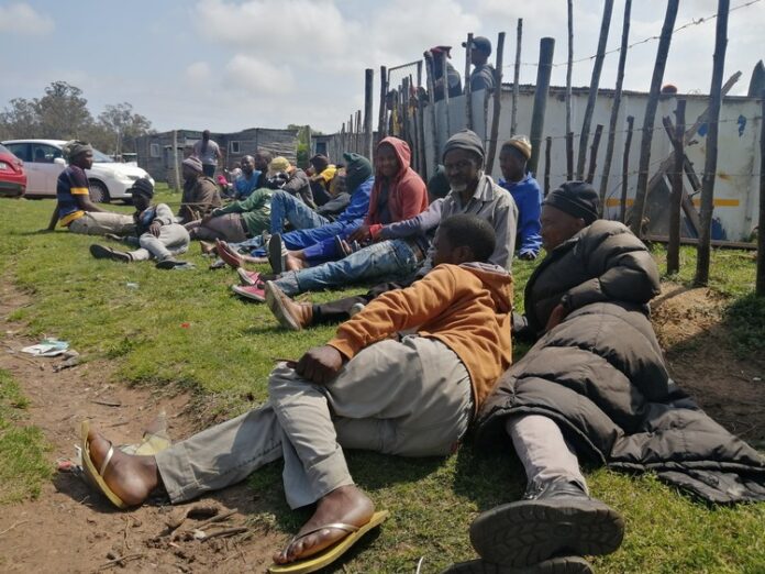 blue_dippin_race_course_groomers_2020_extra_large Former Dippin Blu Racing grooms in Port Elizabeth during a meeting outside the Fairview informal settlement where most of them live. Photo: Mkhuseli Sizani