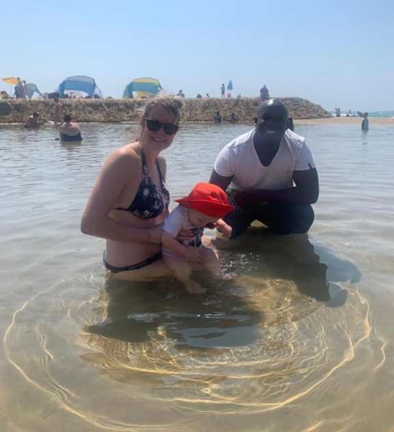 Lovemore with Sean's family on his first trip to the beach. Photo: Sean Williams